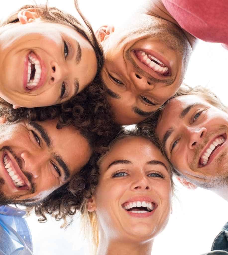 Smiling person showcasing white teeth after laser whitening treatment Wolverhampton
